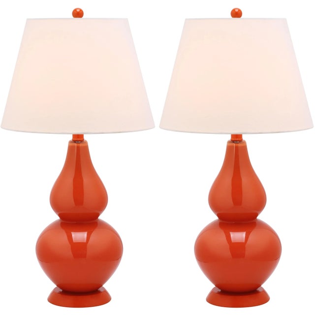 Casting a colorful glow in any room, the sparkling blood orange Double Gourd Glass Lamp is adorned with coordinating...