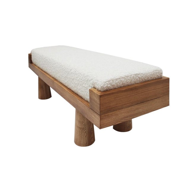 This contemporary bench embodies the raw elegance of Brutalist-inspired design. Handcrafted in Italy from solid oak, its...