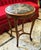 Bring classic French elegance to your interior with this beautiful Louis XV-inspired side table, featuring a rich wood...