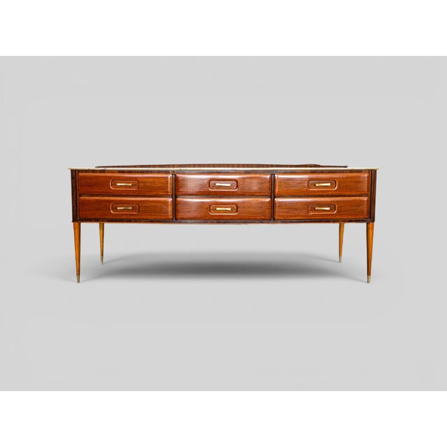 Architectural restraint, carefully balanced proportions and meticulous craftsmanship define this elegant Italian chest of...