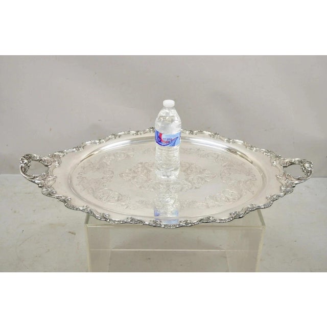 Antique English Victorian Silver Plated Large Oval Twin Handle Serving Platter Bar Tray. Item features a large oval form,...