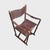 pair of vintage wood and leather safari style chairs