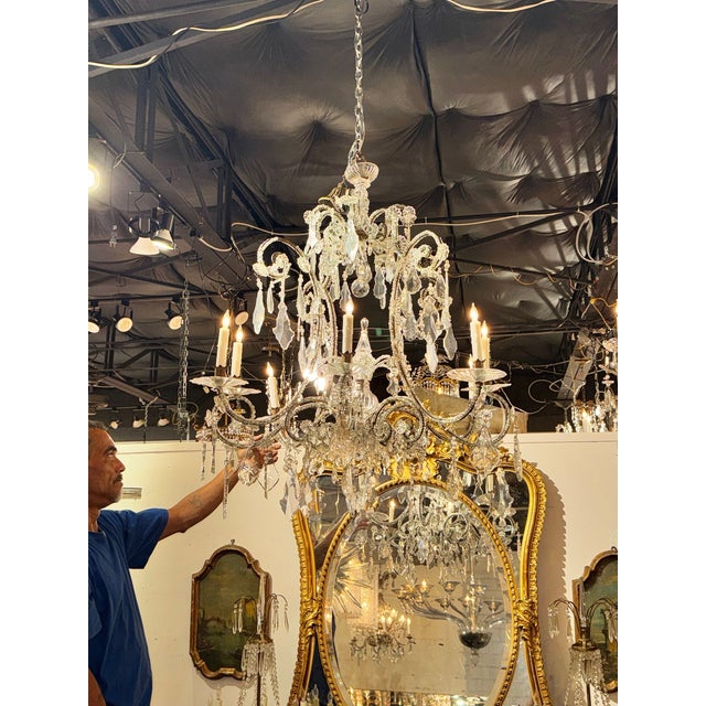 This Large Italian Beaded Crystal Chandelier is a luxurious and elegant fixture. The chandelier features intricate...