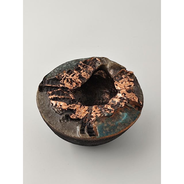 Maria Hadamcsik (born 1936) is a highly regarded Hungarian ceramicist among collectors. She developed her own recipes for...