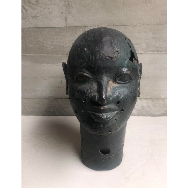 Artist unknown Africa H 42cm W 28cm An expressive cast bronze head inspired by the traditional royal portrait sculptures...