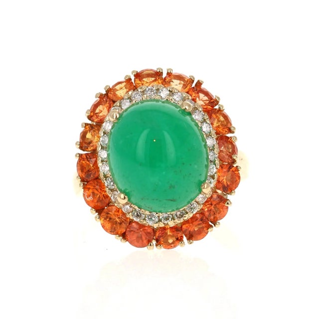 9.04 Carat Emerald Diamond and Orange Sapphire Cocktail Ring! The most unique ring of all! A beautiful Cabochon Emerald...