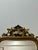 Michele Grasso, sculptor, Gilded wood mirror dating back to the 1950s. It features a contoured frame with carved floral...
