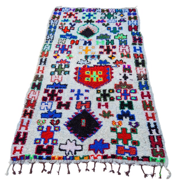 One-of-a-kind rug hand-knotted in the High Atlas Mountains of Morocco with soft organic wool. Featuring an ornate rhythmic...