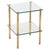 Elegant and unique two-tier side table in solid brass and thick crystal glass. This stylish piece was produced in France...
