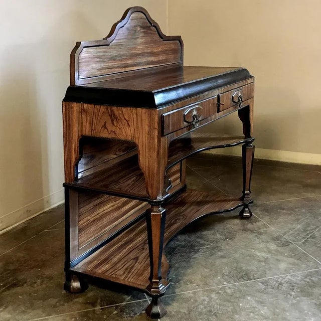 French Art Deco Period Rosewood Buffet features exotic rosewood veneers atop a timeless framework which provides three...