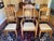 This vintage English table extends in size with a crank that opens the top of the table so that 1 or 2 extra leaf inserts...