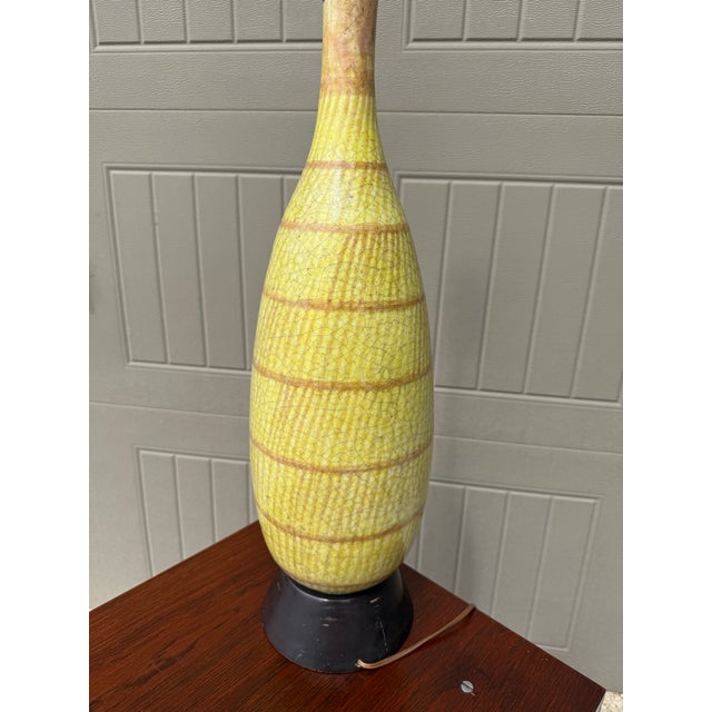 Stunning, original Guido Gambone lamp in typical thick crackle glaze. I’ve only seen one other in this pattern and color,...
