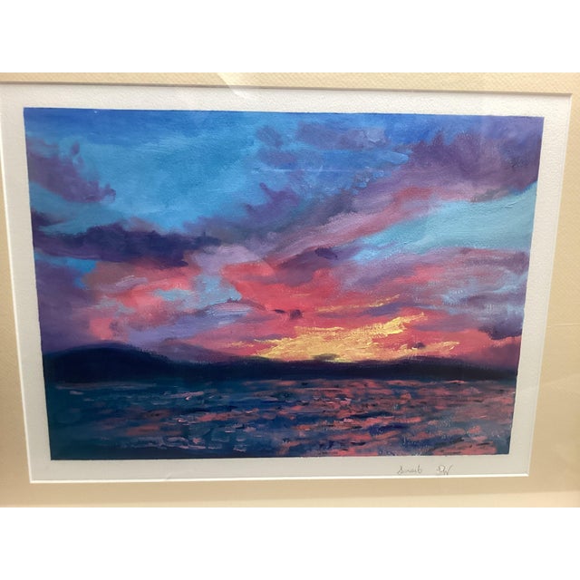 A beautifully executed gouache watercolor capturing a dramatic and richly colored sunset over water. The artist...