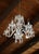 This beautiful vintage five-arm glass estate chandelier features cascading crystals that beautifully catch the light,...
