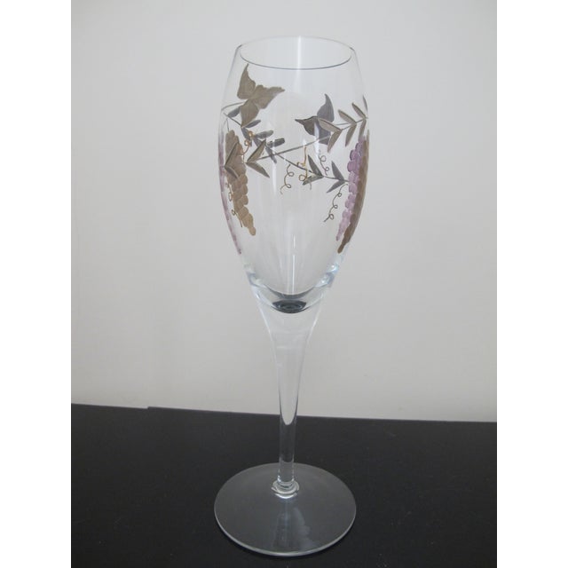 Endearing Royal Danube or Rosenberg Romanian crystal wine glass. Featuring a design of two grape bunches, one in a golden...