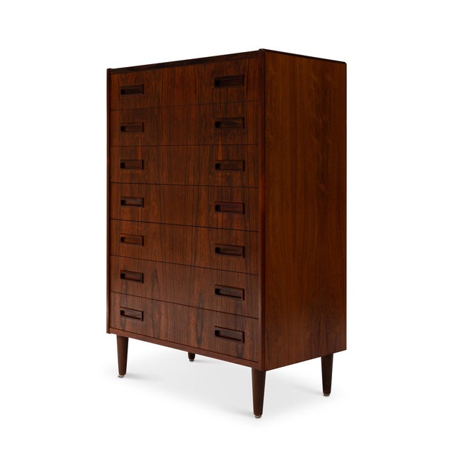 This handsome rosewood tallboy dresser, crafted in Denmark during the 1960s, epitomizes the superior craftsmanship of the...
