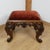 A mid-19th century solid walnut carved stool on cabriole carved legs. Re-upholstered in burgundy fabric\. Dimensions: h...