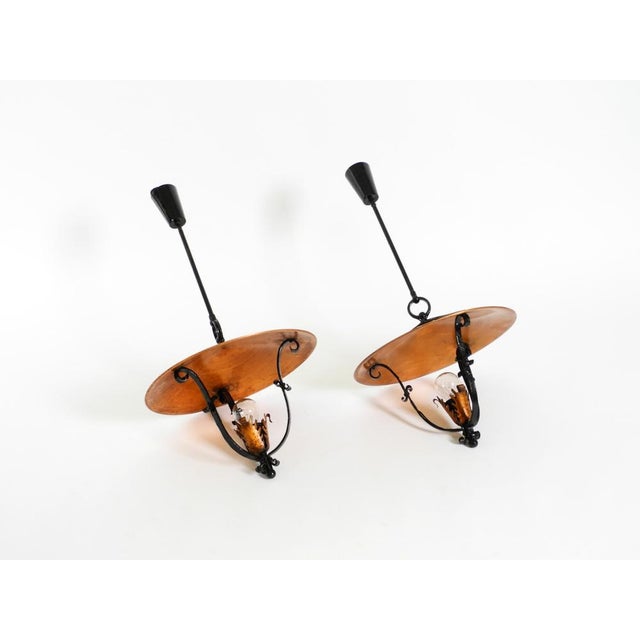 Pair of large, original 1930s pendant lights made of heavy metal and copper. great, very robust 1930s design. solidly...
