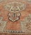 This beautiful Turkish Oushak Rug has a medium blue color with a light orange background. The center medallion has earth...