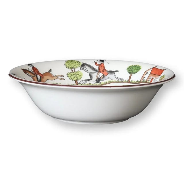This delightful piece is a Crown Staffordshire fine bone china bowl, featuring a vibrant fox hunting scene that encircles...