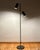 This elegant gunmetal brown two-light floor lamp features omi’s renowned articulating joints and reflects the precision...
