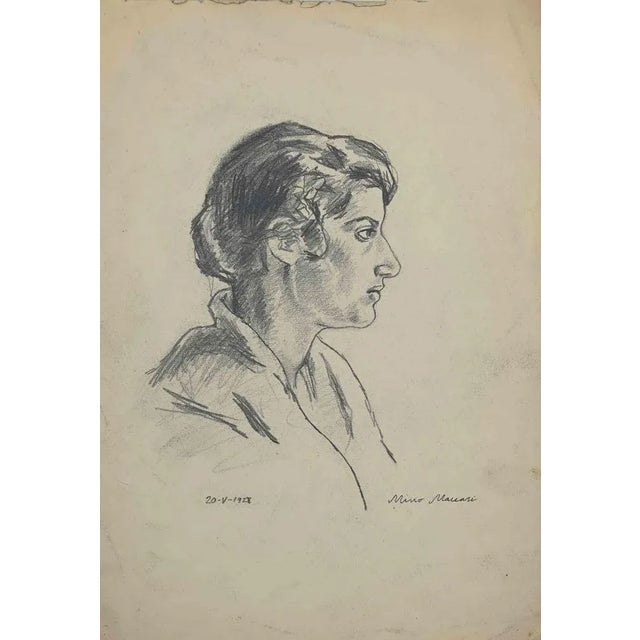 Portrait of Woman is an original Pencil Drawing realized by Mino Maccari in mid-20th century. Good condition on a yellowed...