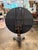 An exceptional 19th-century Chinese Export black lacquer and gilt decorated tilt-top guéridon center table. This striking...