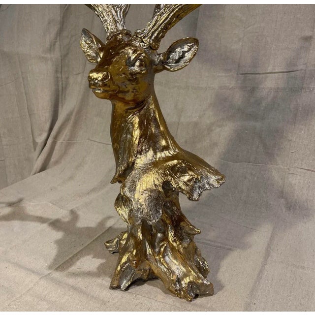 Gold leaf stag deer head with removable antlers. Makes a statement on a table, chest, sideboard or bookcase. Perfect for a...