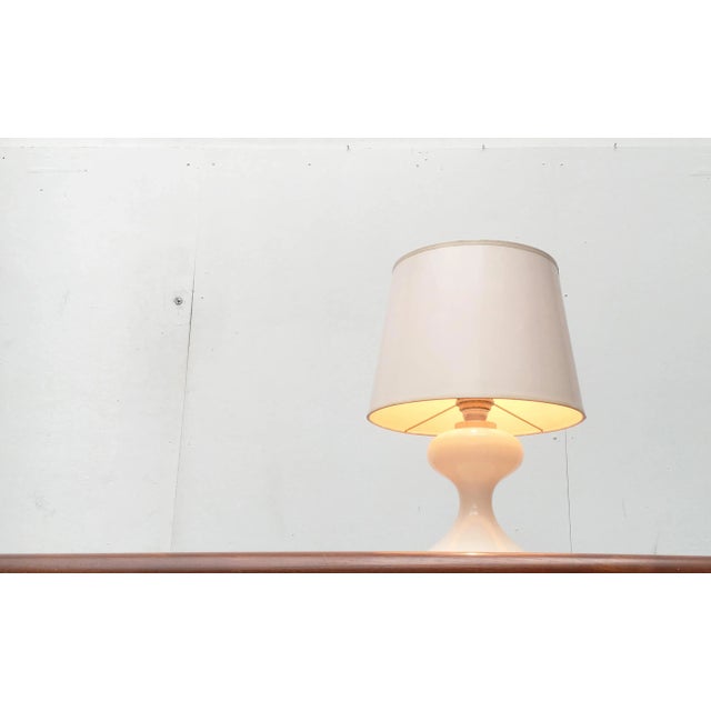 An early design of the famous luminaire designer Ingo Maurer from the late 60s. An elegant and classic design. The base is...