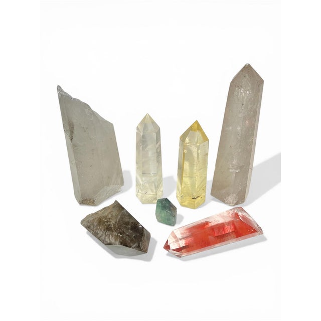 Collection of seven (7) cut quartz (rock crystal) specimens, the largest of which measuring 12 3/4 by 3 by 3 inches, plus...