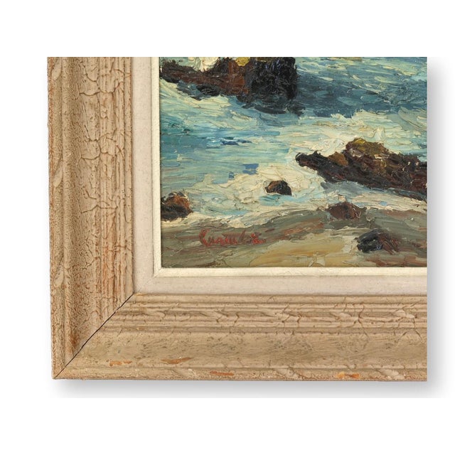 French oil on canvas depicting the rocky shoreline at La Baule with sunlight reflecting across the sea. Painted with...