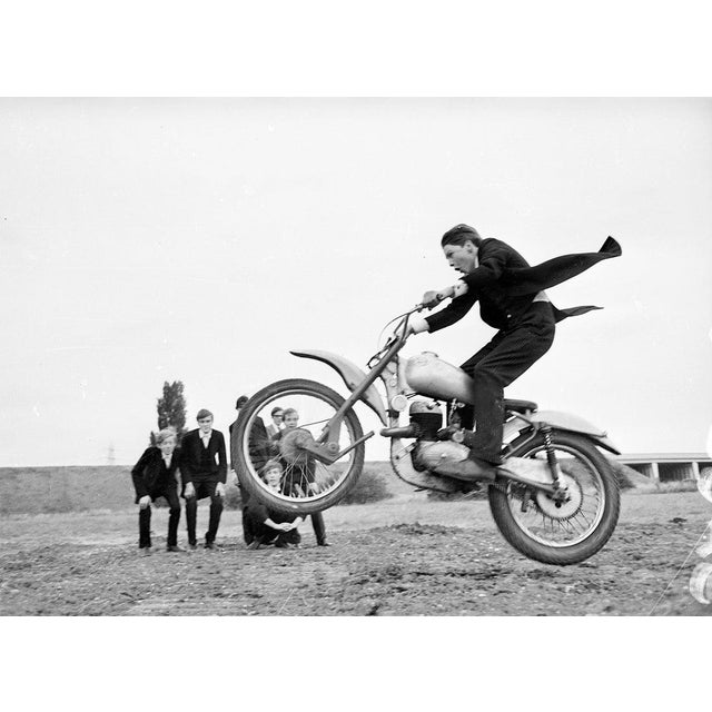 Eton Bikers 10th July 1966: A group of Eton schoolboys riding motorbikes in an empty field. (Photo by Potter/Express/Getty...