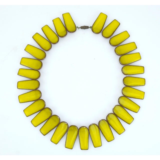 A stunning 1960's art pottery necklace by Brondsted of Denmark which combines the vibrancy of artisan design and modernist...