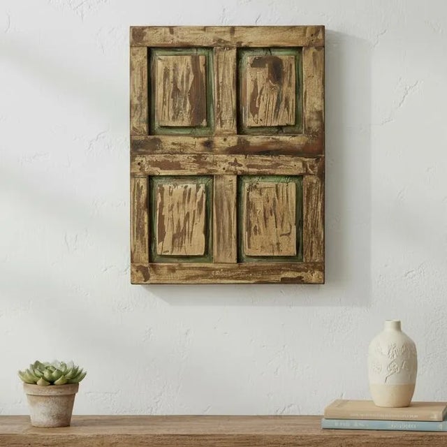 Invite a whisper of history into your home with this breathtaking Antique Shutter Art, a one-of-a-kind treasure salvaged...