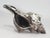 Offering a vintage conch shell dipped in a silver alloy, circa Late 20th Century. This gorgeous small seashell is a REAL...