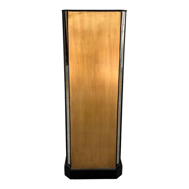 Modern Port 68 Gold Pedestal. Rectangular shape with mirrored edges. Black accents. Showroom floor sample.