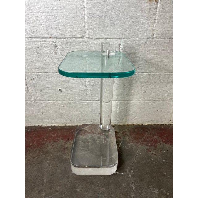 An incredible design in outrageously thick acrylic by Les Prismatiques, circa 1970s. The drink or side table features...