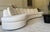 Custom Curved sofa in Kravet off-white soft fabric, 145"W x 29"H x 59"D