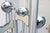 Modernist twelve light floor lamp. Chrome plated with six protruding arms with an up and down light on each arm. Mounted...