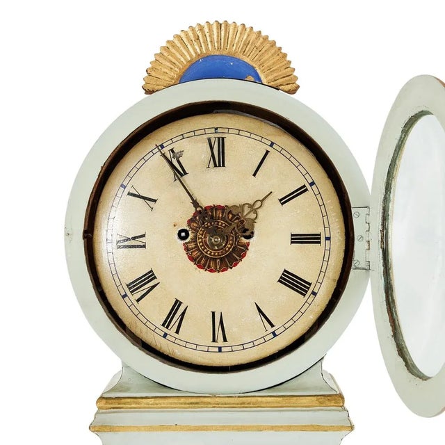 Antique Swedish Mora clock 1800's in off-white with gold hand painted intricate detailing. Working Longcase clock...