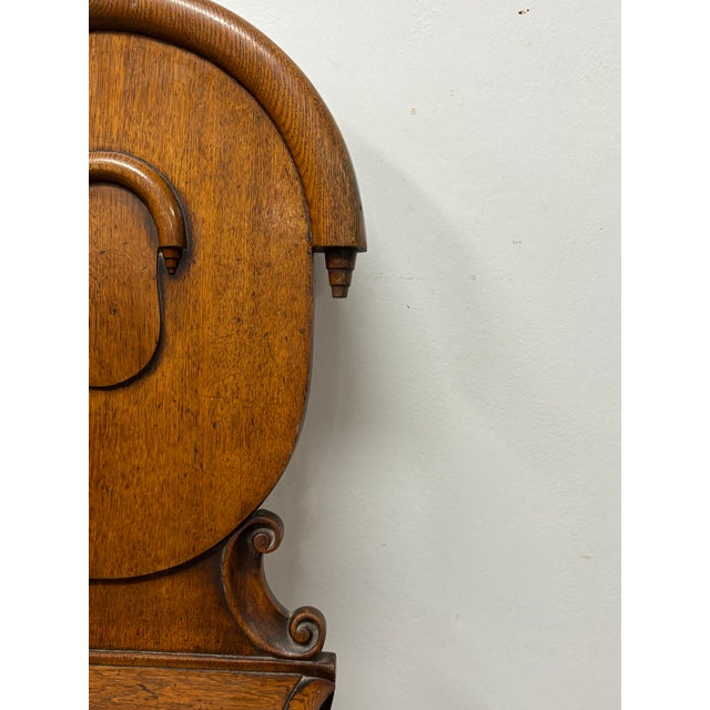 A handsome 19th century English mahogany hall chair, a form once commonly found lining the grand entrance halls of country...