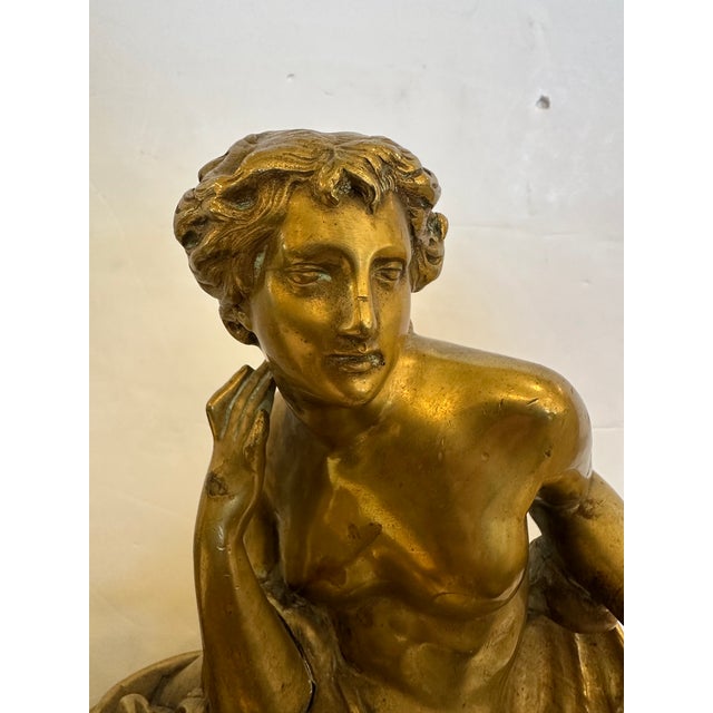 Large scale very impressive pair of antique French bronze figural chenets andirons having fierce mythological male...