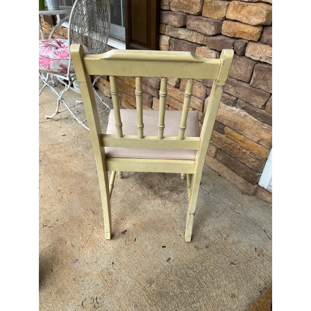 Up for consideration is a light colored bamboo chair with a cushion. This would look lovely in your home and is a great...