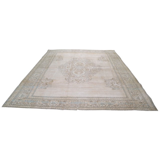 Hand-knotted with care using traditional rug making techniques, this wool rug blends timeless craftsmanship with a modern...