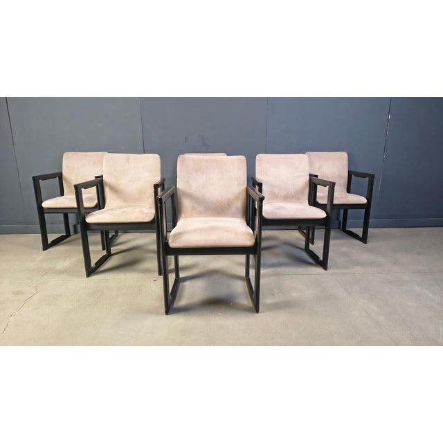 Set of 6 vintage dining chairs designed in the manner of Tobia & Afra Scapra. They feauture an ebonized wooden frame with...