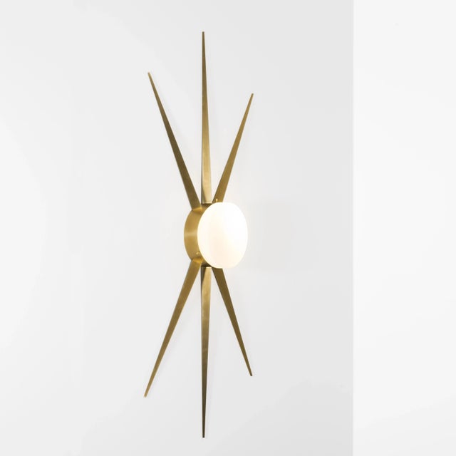 The Solare Classic Wall / Ceiling Light brings elegance to midcentury design through the inspiration of Italian design -...