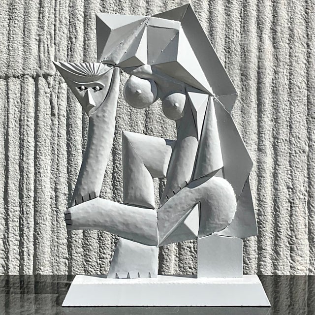 A fantastic vintage Contemporary metal sculpture. A beautiful Cubist design finished in a glossy white. Acquired from a...
