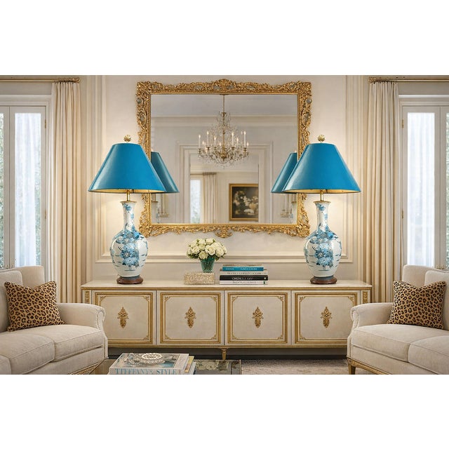 Offering a pair of EXTRA LARGE Japanese "Kutani Ware"" hand painted porcelain table lamps with Cerulean blue peacocks and...