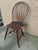 A beautiful antique hand-carved Windsor bow-back side chair America, Circa 1790 Measures: 19”W x 16.5”D x 36.75”H. Seat...