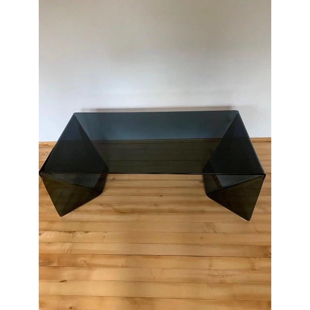Origami coffee table designed by Neal Small from the 1960s. The table is in its original condition. Made of bent, dark,...